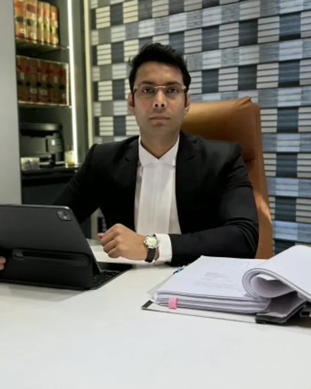 Kanisth Manuja, Founding Partner of Manuja Law Partners, at his desk in the firm's chamber